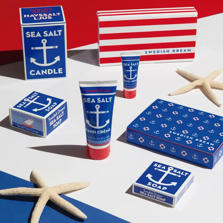 Swedish Dream sea salt range: candle, hand cream and soaps with starfish on red and white stripes