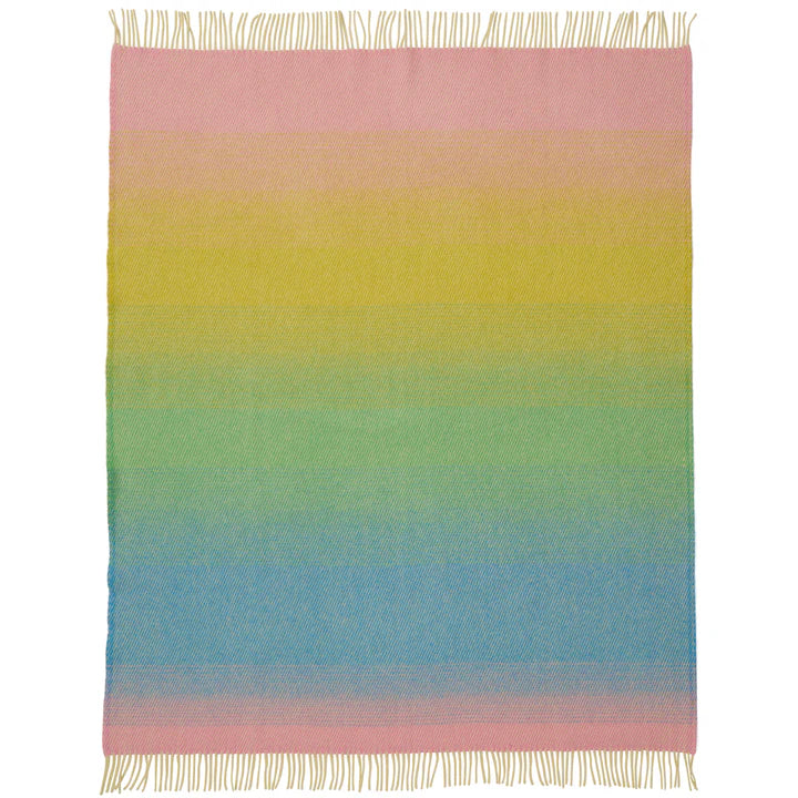 Aurora throw unfolded showing its rainbow gradient