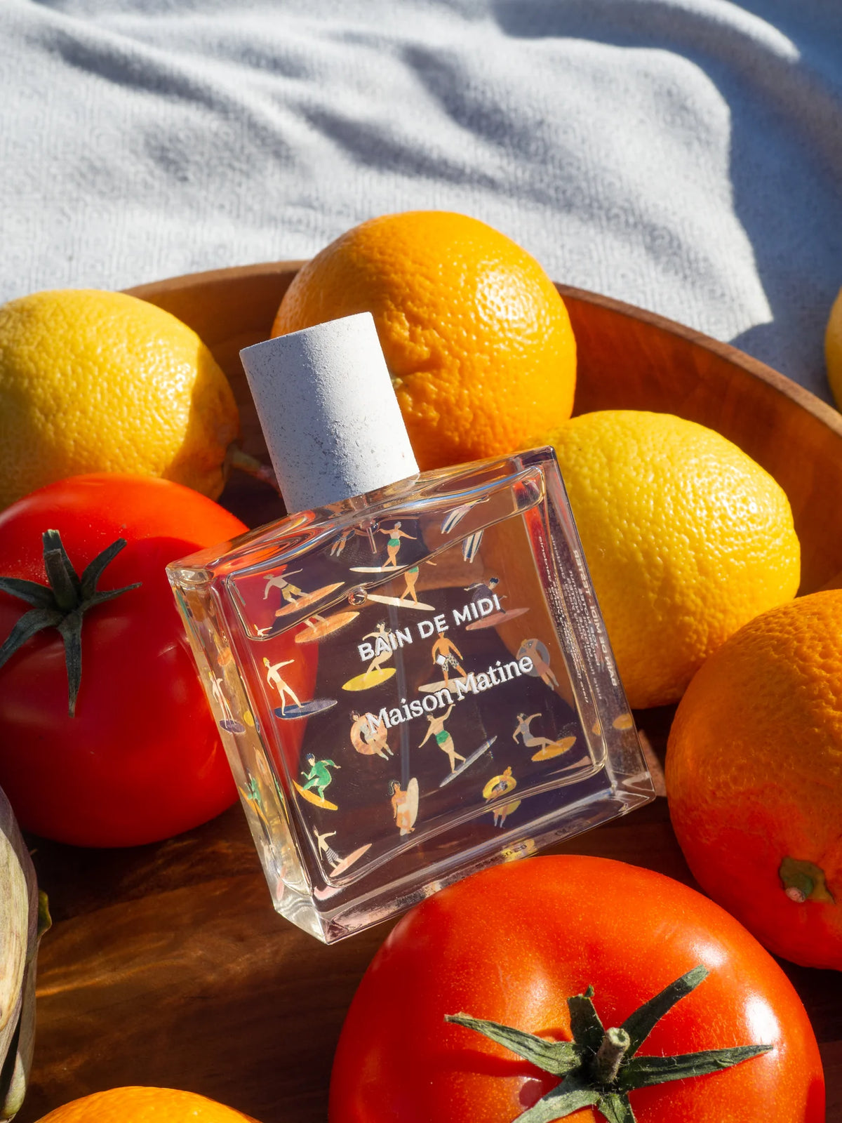 Bain de Midi perfume among oranges and tomatoes