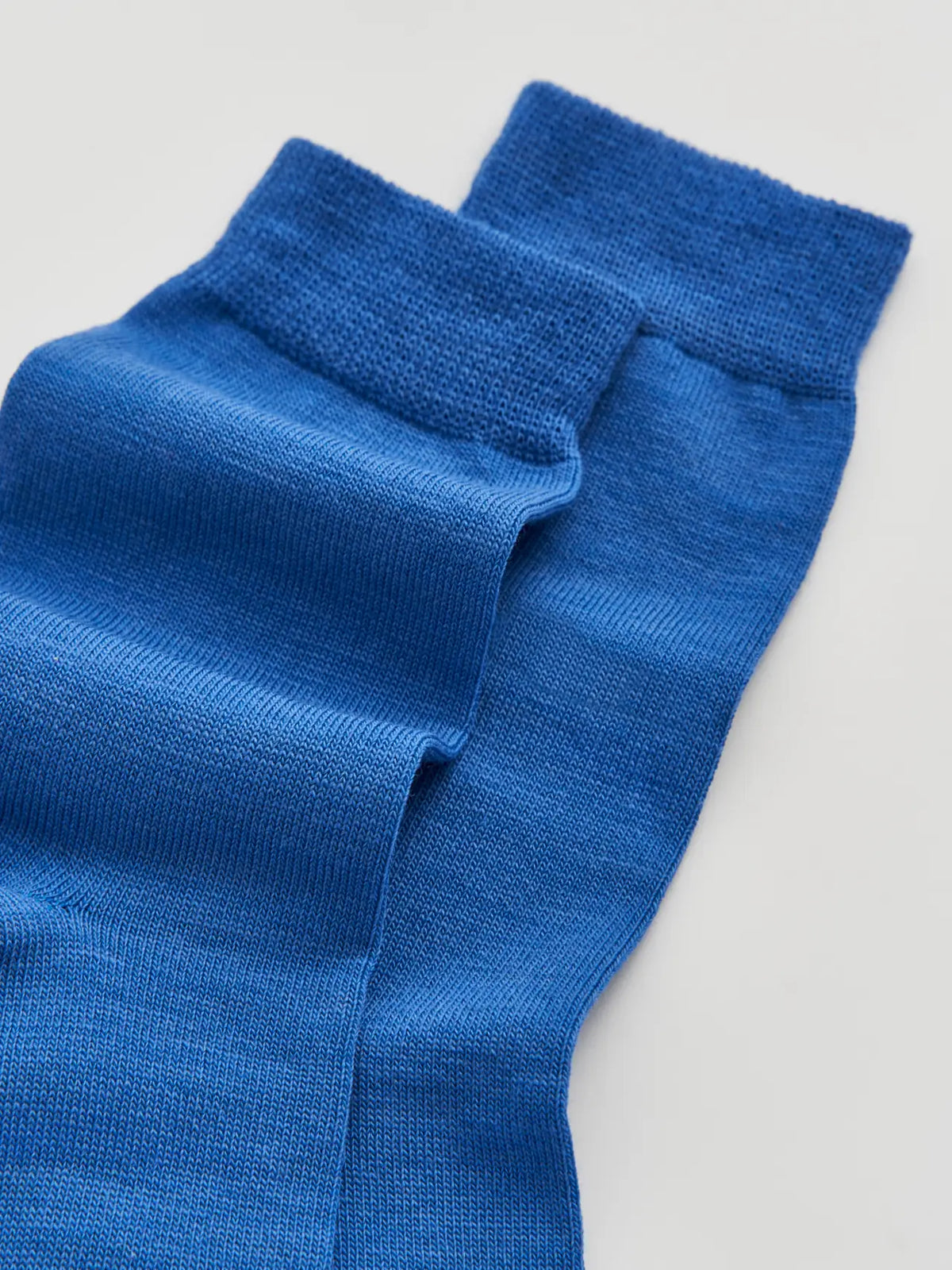 Close-up of the strong blue merino knit