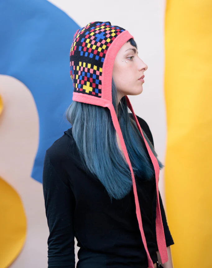 Woman with blue hair wearing the granny squares bonnet