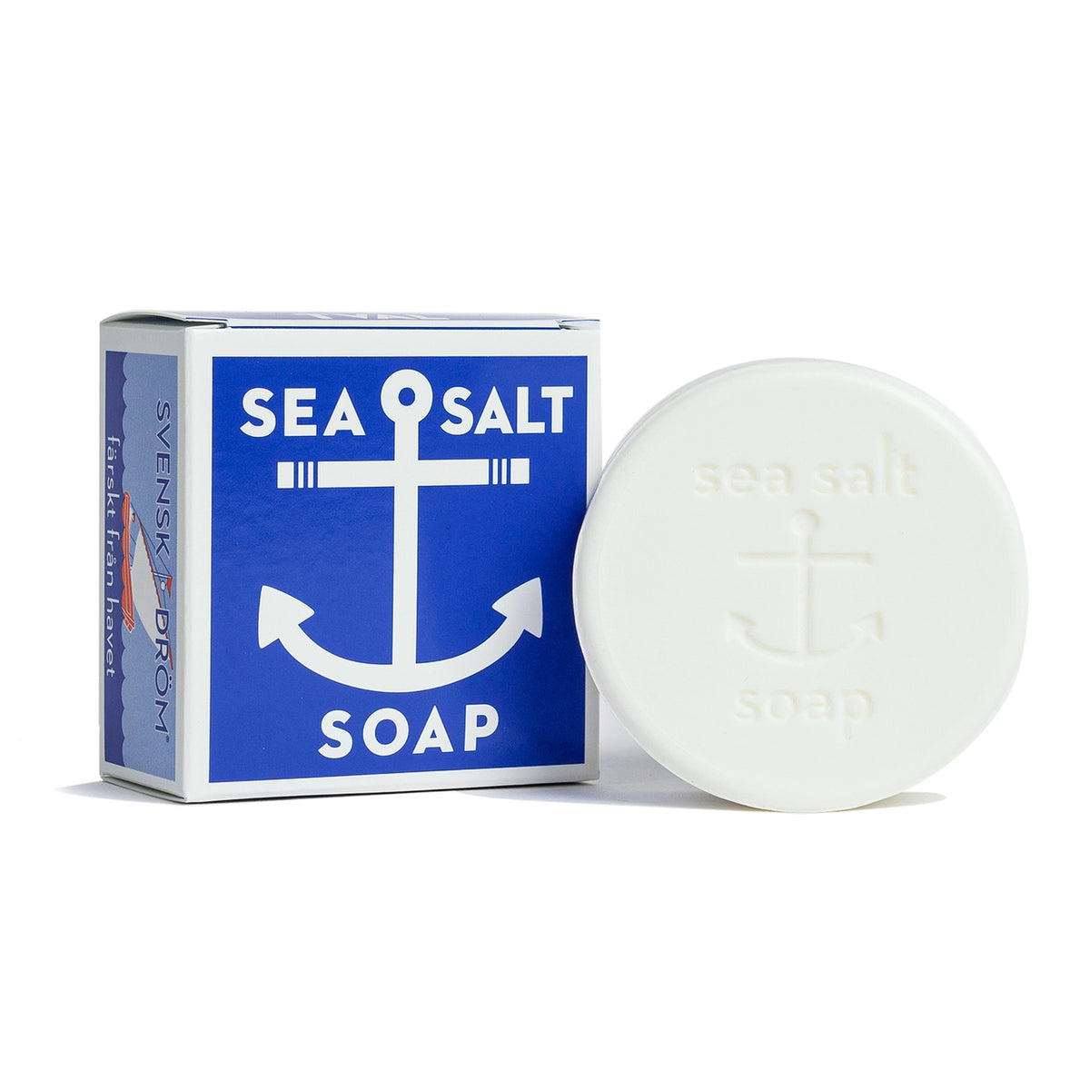 Swedish Dream sea salt soap: a round bar with an anchor beside its blue box