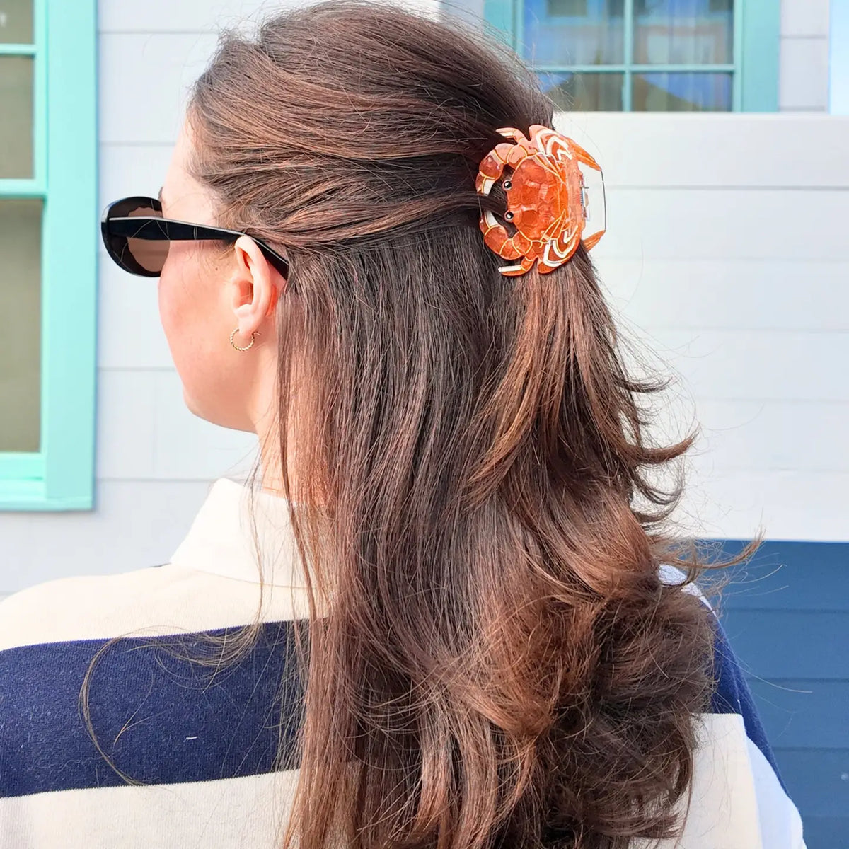 Crab claw clip in long brown hair