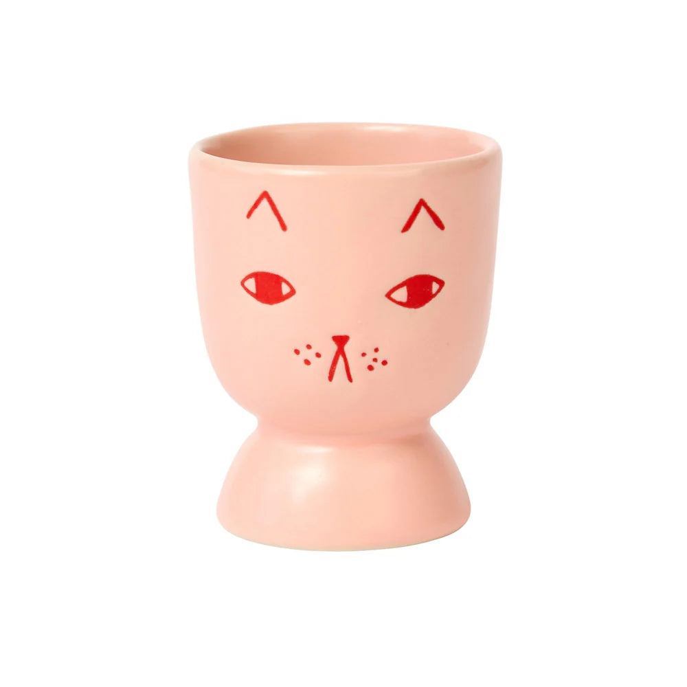 Donna Wilson peach egg cup with a cat face