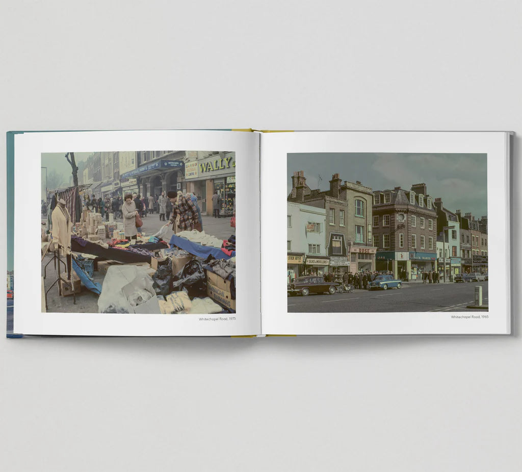 Book open at colour photos of an East End street market and shopfronts