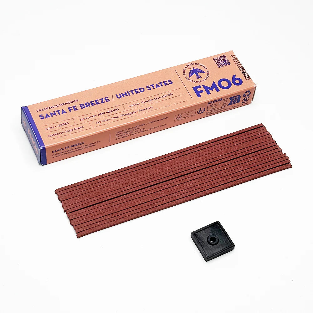 Fragrance Memories Santa Fe Breeze / United States incense: a bundle of sticks in front of the FM06 box, with a black holder
