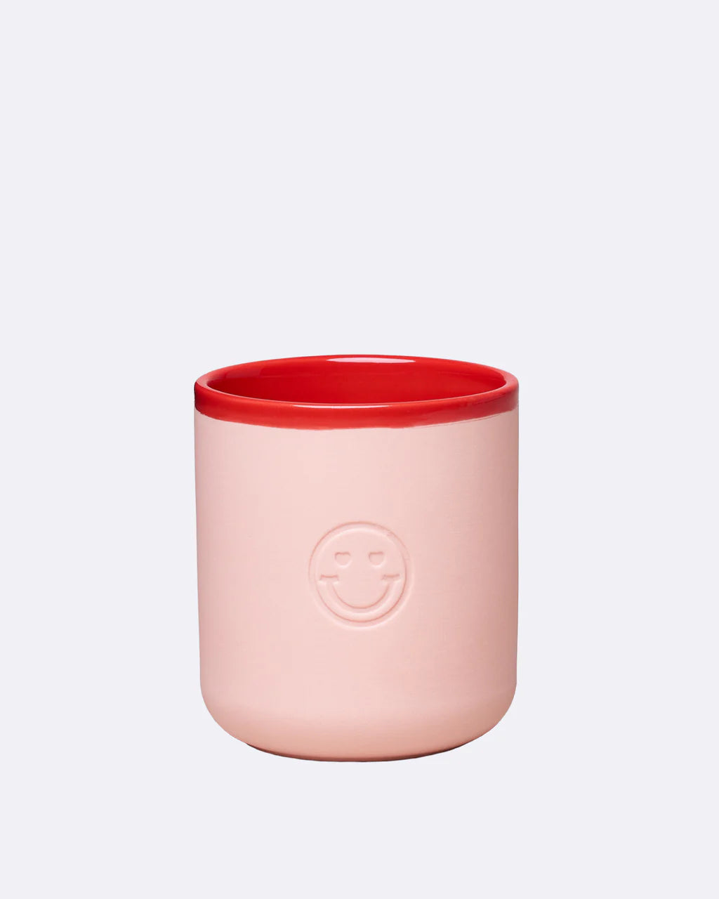 Chic Mic pale pink cup with a red rim and embossed smiley face