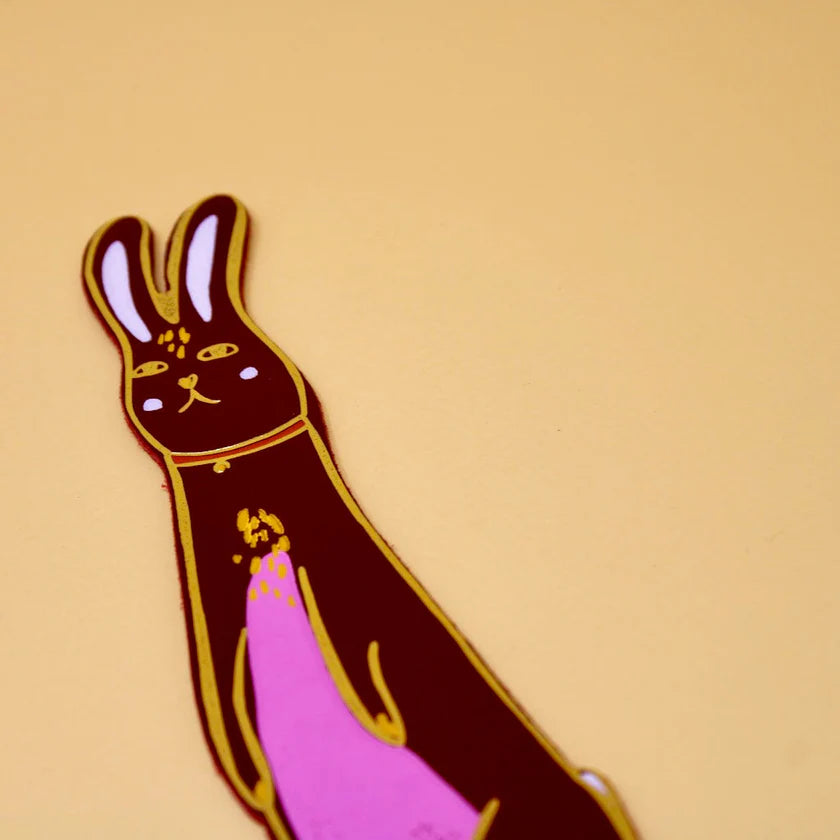 Dark red leather bunny bookmark with a pink patch