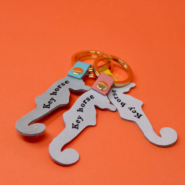 Ark seahorse key rings in silver reading 'Key horse'
