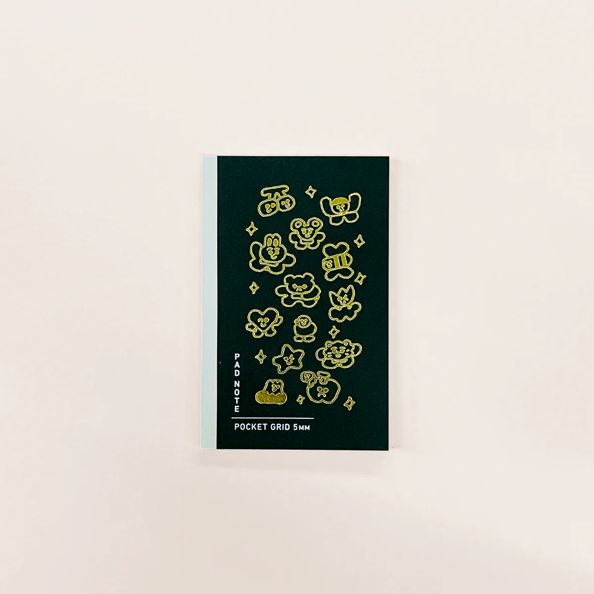Sikigu dark green A6 notebook with gold doodles of little characters