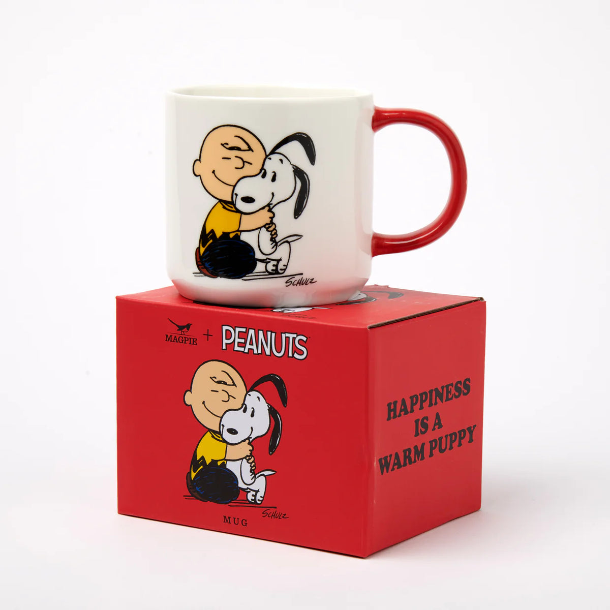 Warm Puppy mug on its red Peanuts gift box