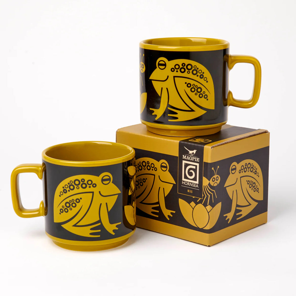 Two chartreuse frog mugs with their gift box
