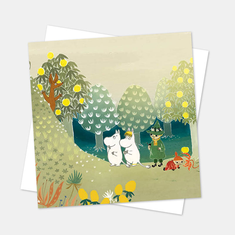 Moomin card of the Moomins and Snufkin on a green hillside with fruit trees