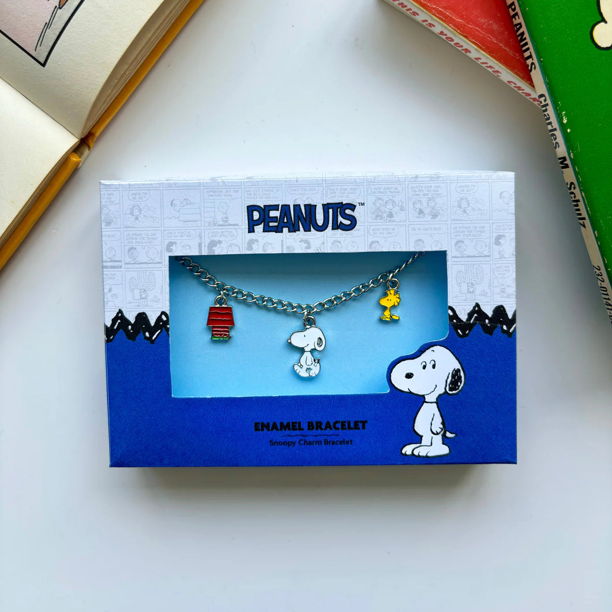 Snoopy charm bracelet in its Peanuts gift box
