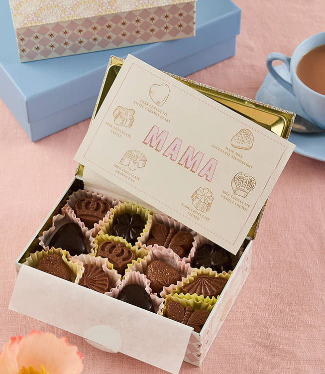 Mama tin open, showing an assortment of chocolates