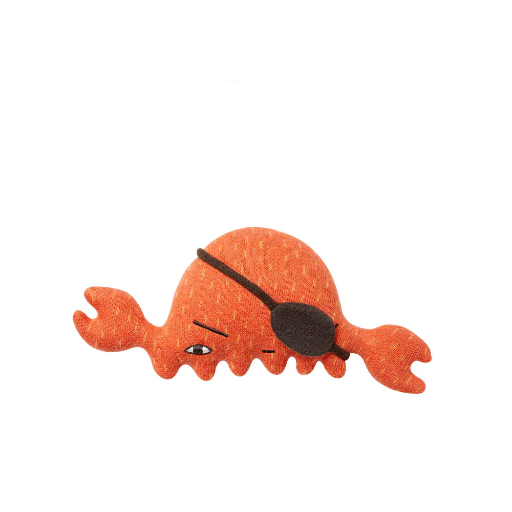 Donna Wilson Wee Ones Nipper: a knitted orange crab with an eye patch