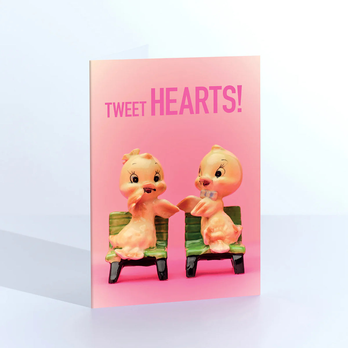 Ornament card: two vintage duckling figurines on a bench, with 'Tweet hearts!' on pink