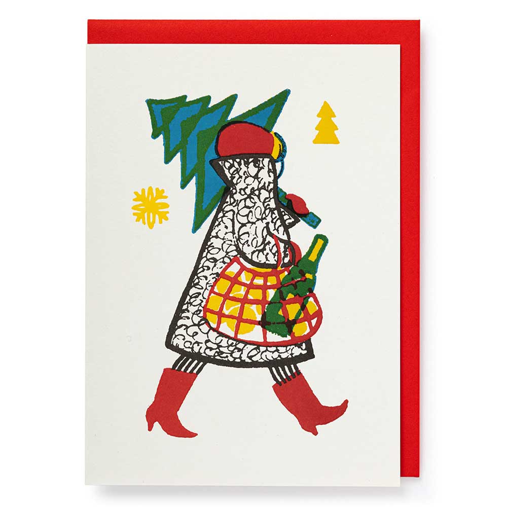 Card of a woman in red boots carrying a Christmas tree and a bottle