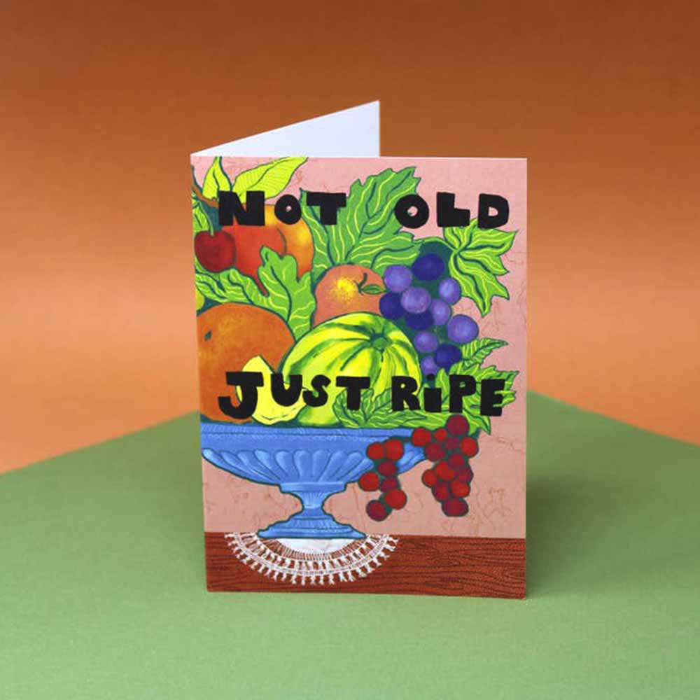 Card with a bowl of fruit and grapes: Not old just ripe