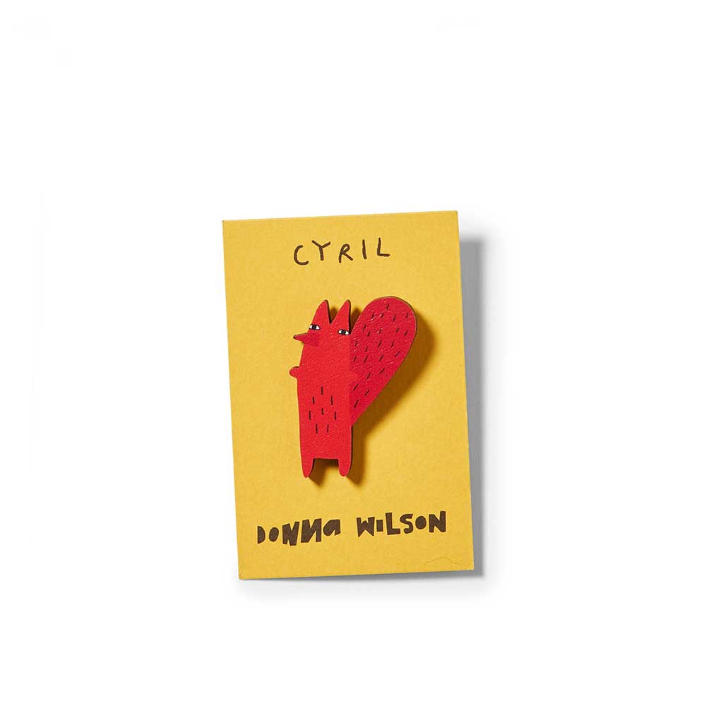 Red squirrel pin badge on a yellow Donna Wilson card: Cyril
