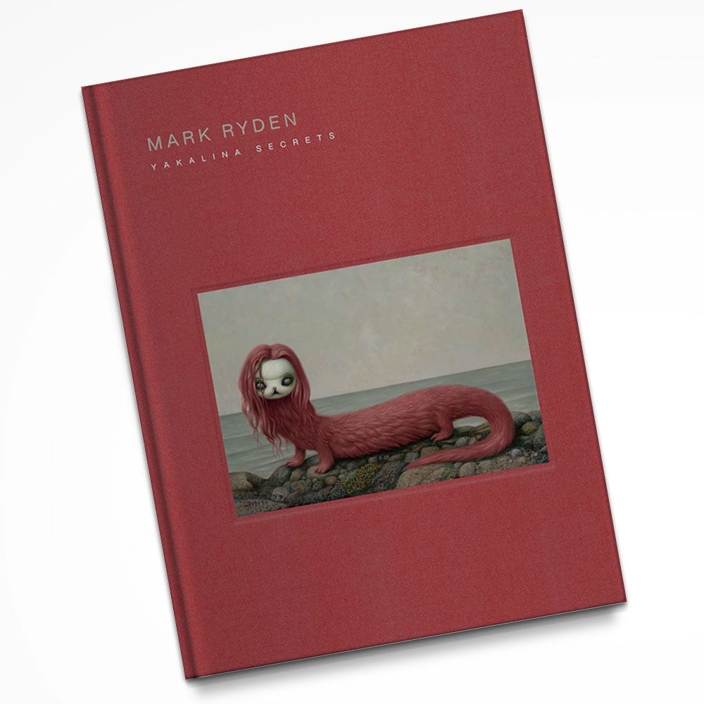 Mark Ryden Yakalina Secrets book with a red cover and a photo of a red sculpture