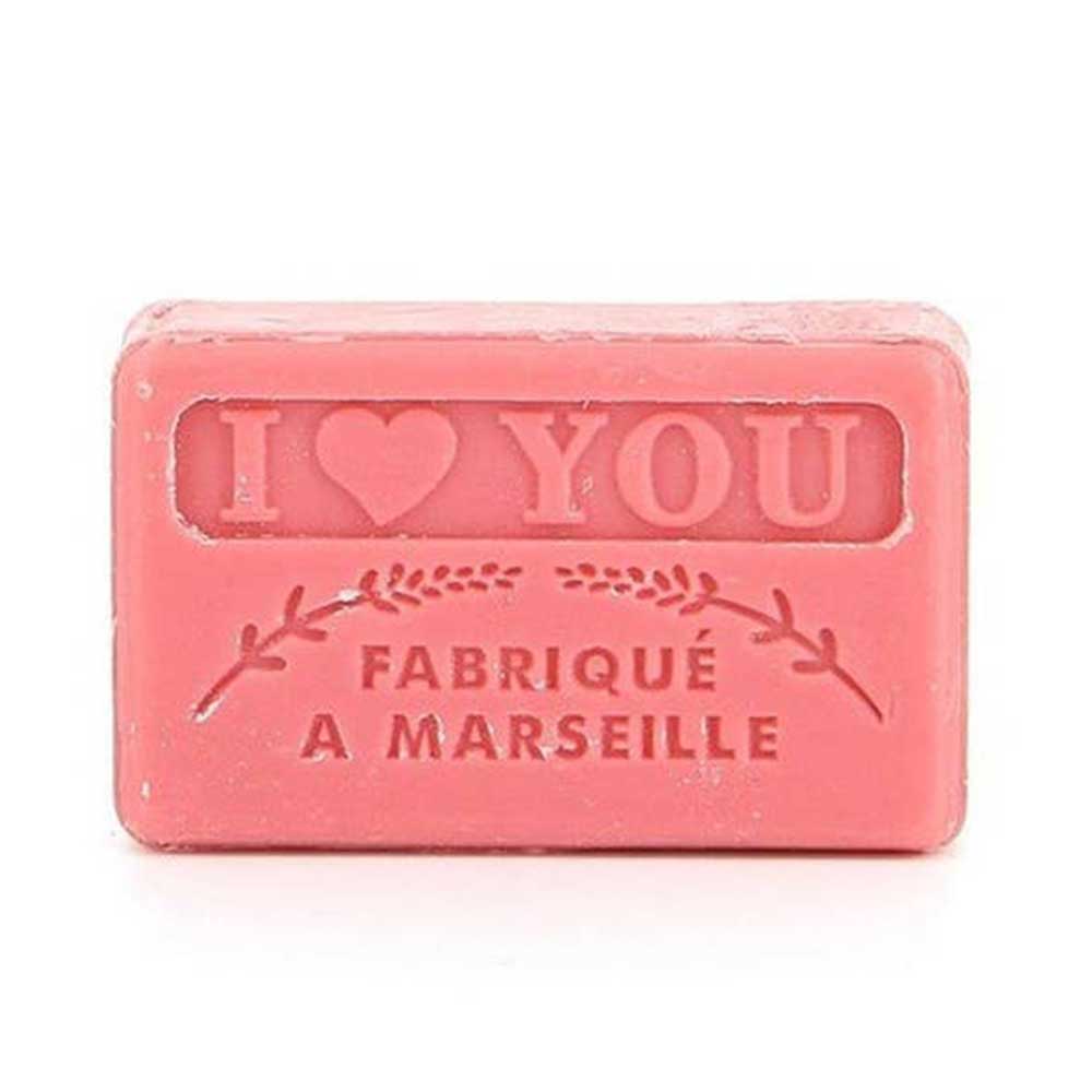 Pink Marseille soap bar stamped: I love you, fabriqué à Marseille