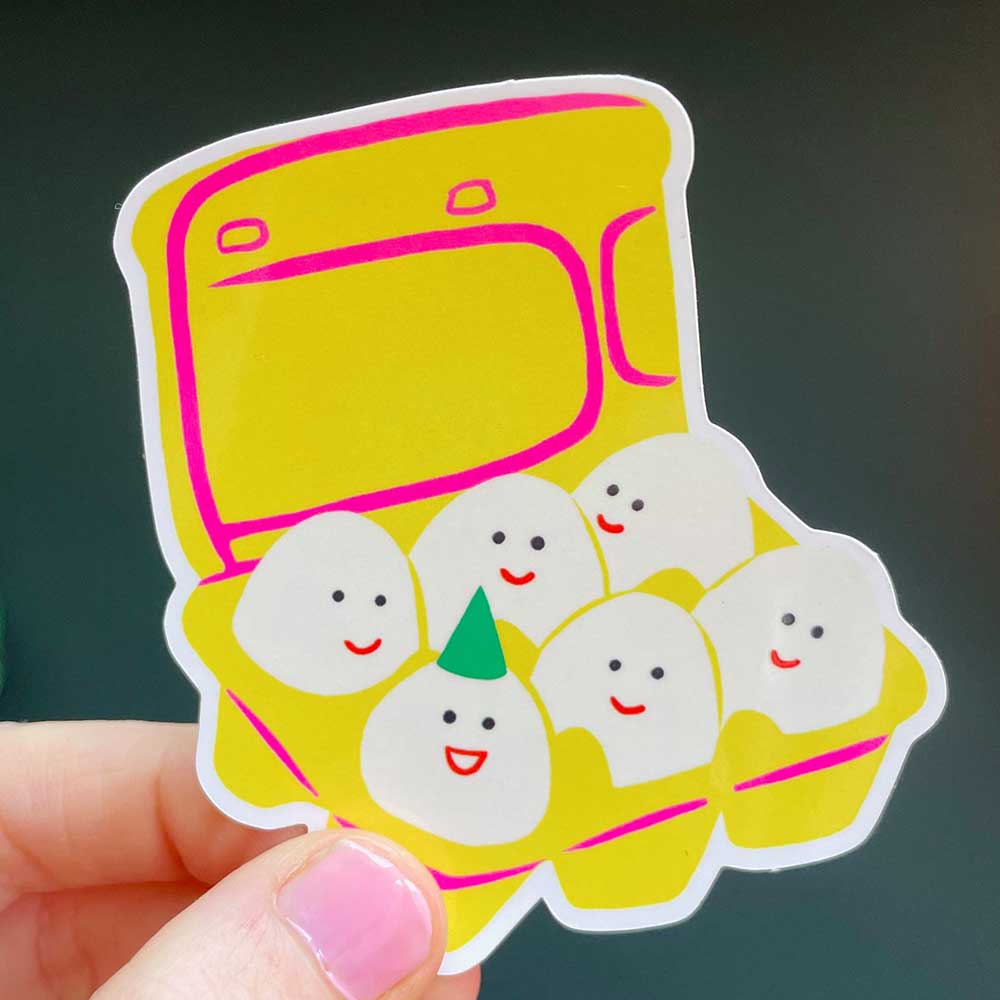 Naomi Wilkinson egg box sticker, close-up
