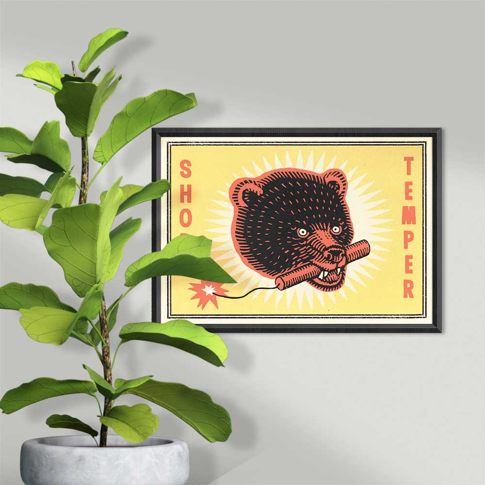 Framed print of an angry bear biting a lit stick of dynamite: Short temper