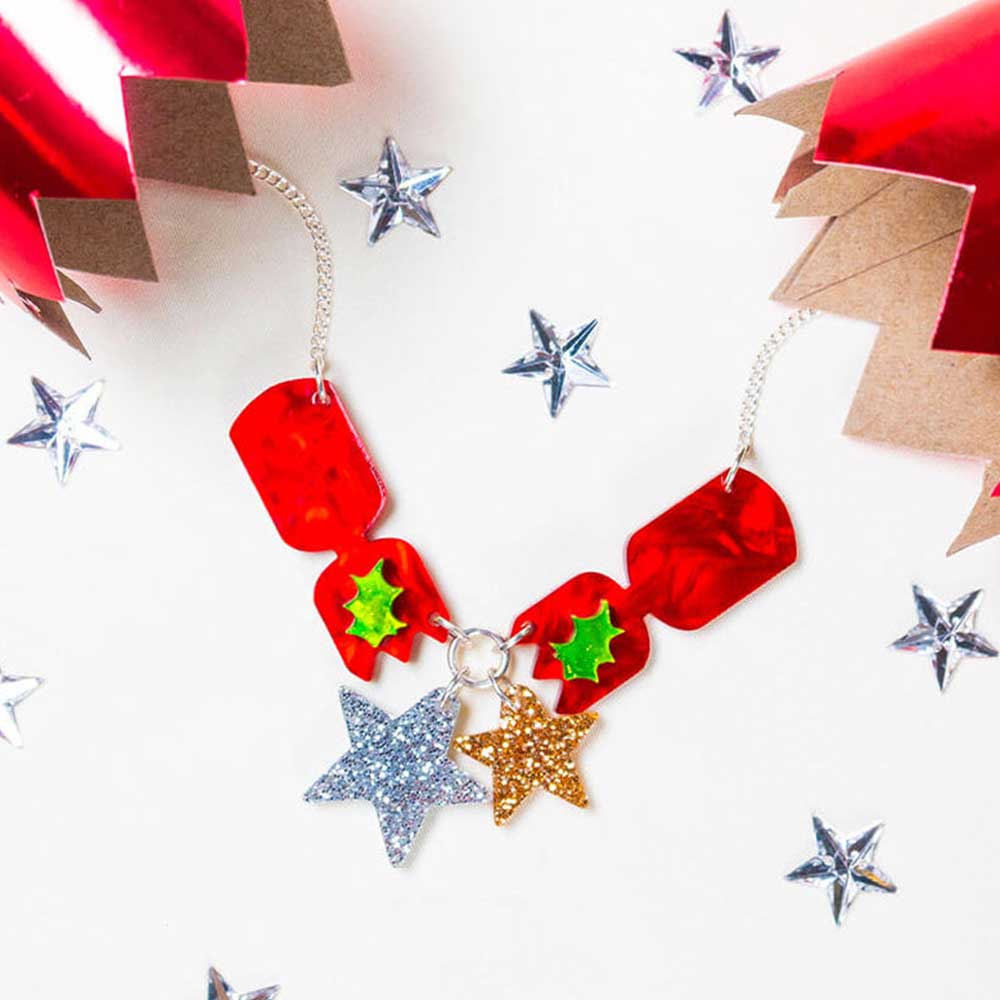Cracker Bang necklace among stars and crackers