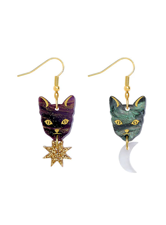 Tatty Devine Astrologer's Cat earrings: purple and green cat heads with a gold star and a moon