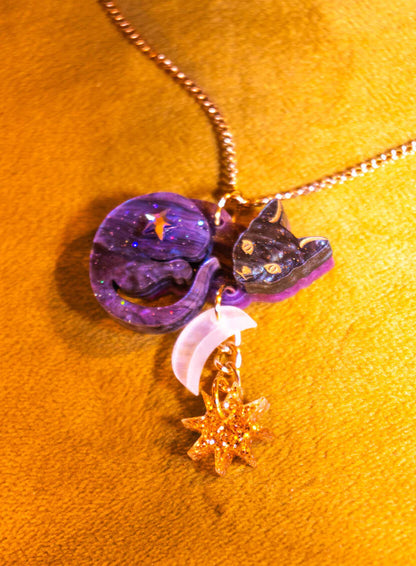 Astrologer's Cat necklace on orange velvet