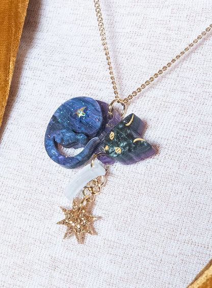 Astrologer's Cat necklace on white fabric