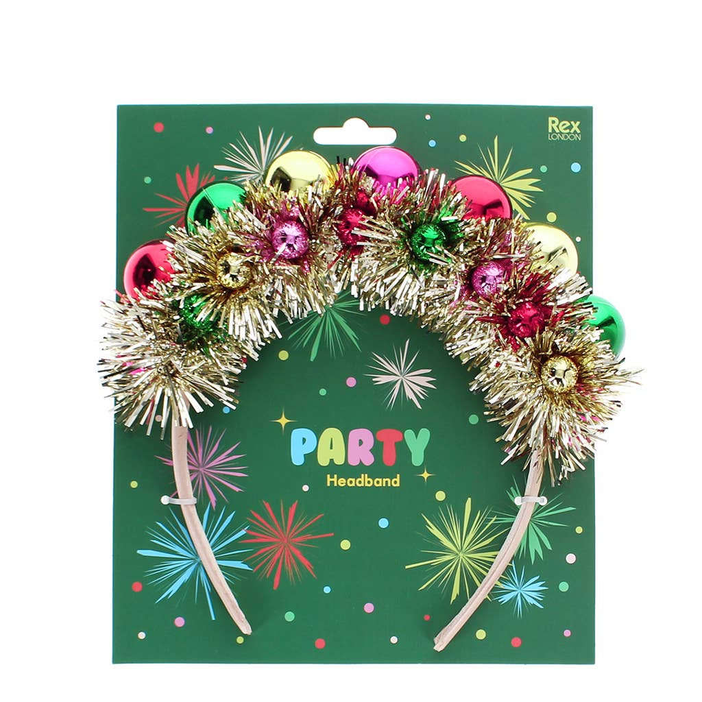 Party headband with tinsel and shiny baubles on its green card