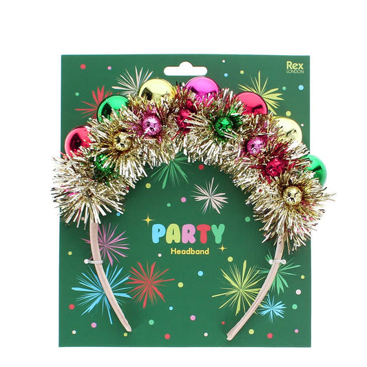 Party headband with tinsel and shiny baubles on its green card