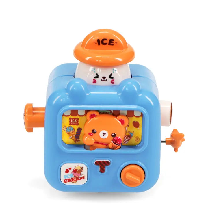 Wind-up ice cream van with a bear inside the window