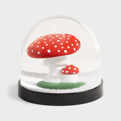 &K Wonderball mushroom snow globe: a red and white toadstool in a glass dome