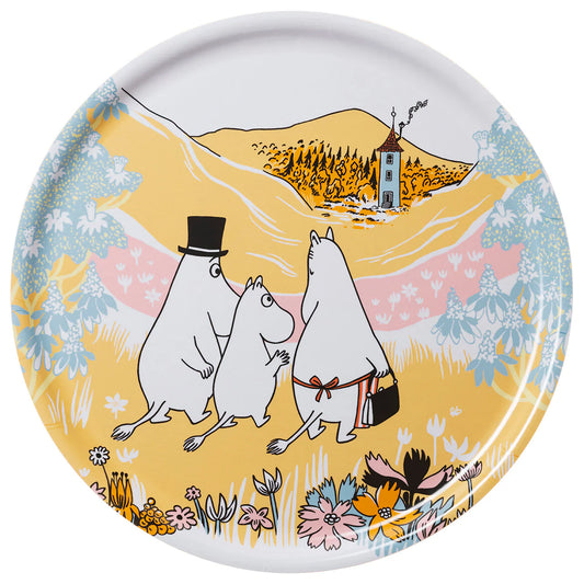 Round Moomin Family Time tray: the Moomin family walking through a yellow landscape