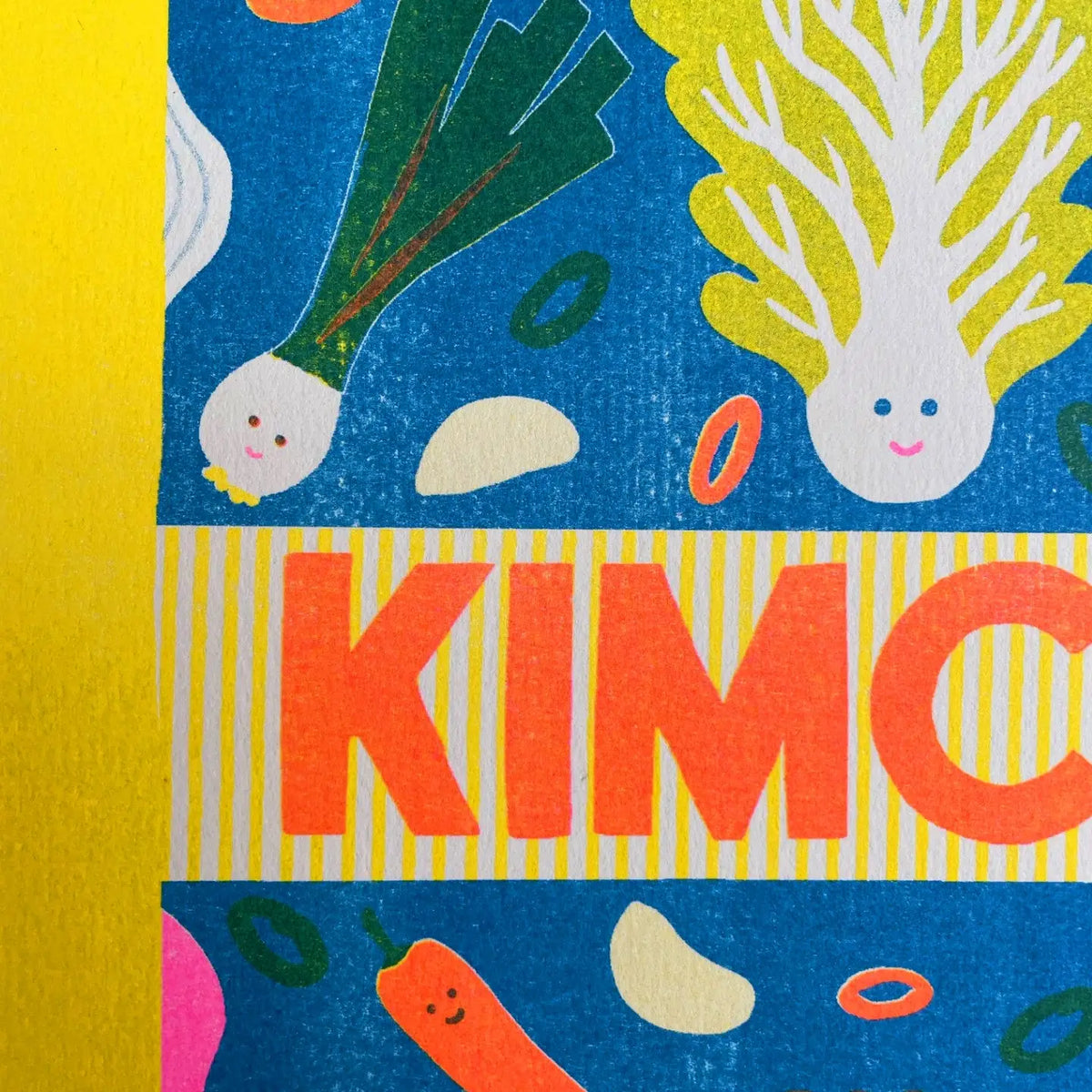 Close-up of the smiling cabbage and leek on the kimchi jar