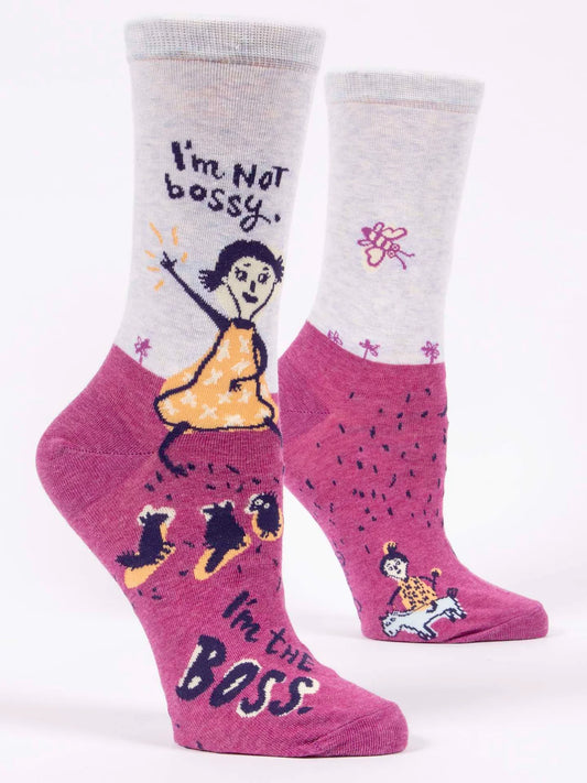 Pink and grey women's socks with a woman waving: I'm not bossy, I'm the boss