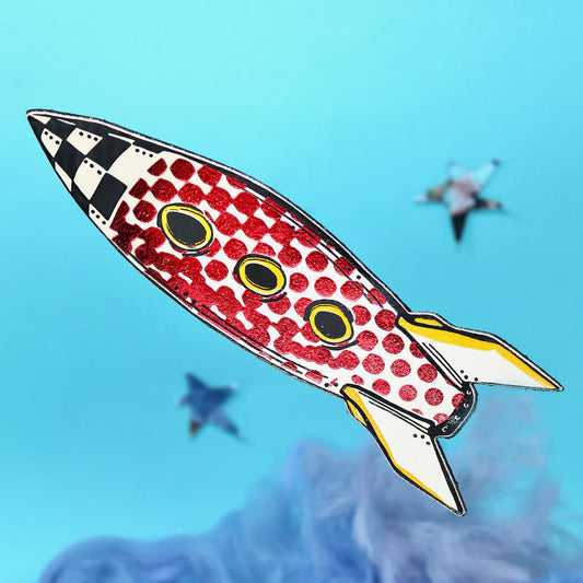 Cream and red spotted leather rocket bookmark with yellow fins