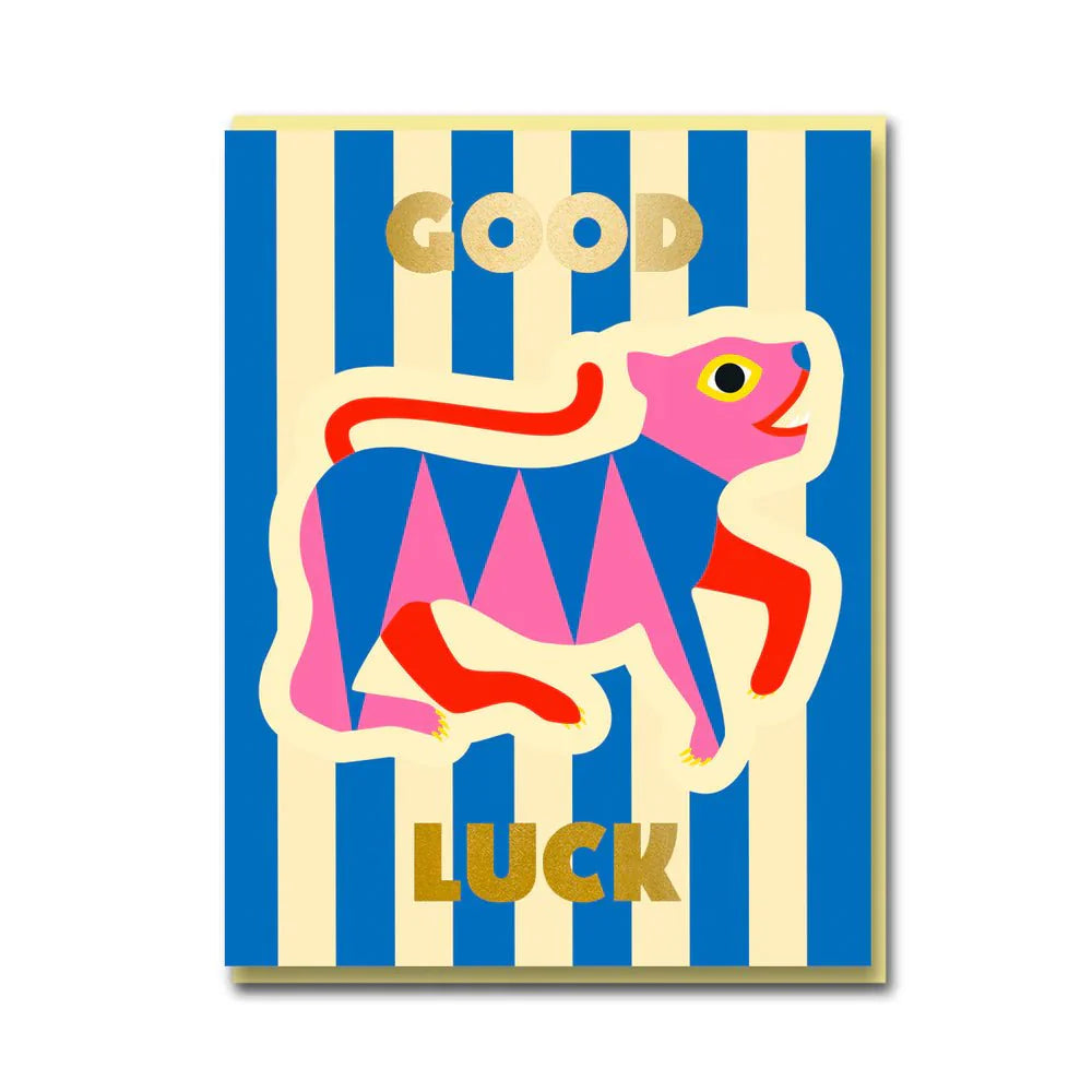 1973 card: a blue and pink tiger on blue and cream stripes, with gold 'Good luck'