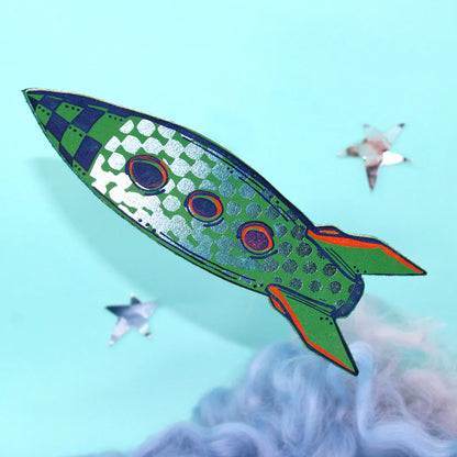 Green checked leather rocket bookmark flying over a blue background
