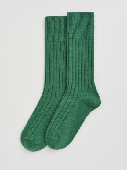 Pair of village green ribbed bed socks laid flat