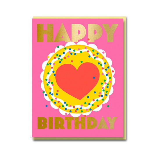 Pink card with a gold sprinkled cake and red heart: Happy Birthday