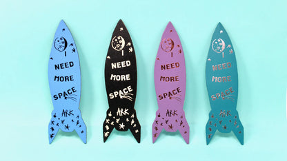 Ark rocket bookmarks in several colours, reading 'Need more space'