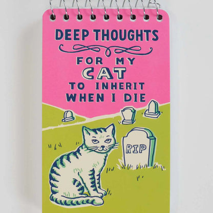 Blue Q mini notebook: a cat by a gravestone with 'Deep thoughts for my cat to inherit when I die'