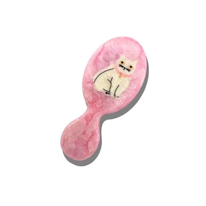 Solar Eclipse pink Kawaii Cat hairbrush with a white cat