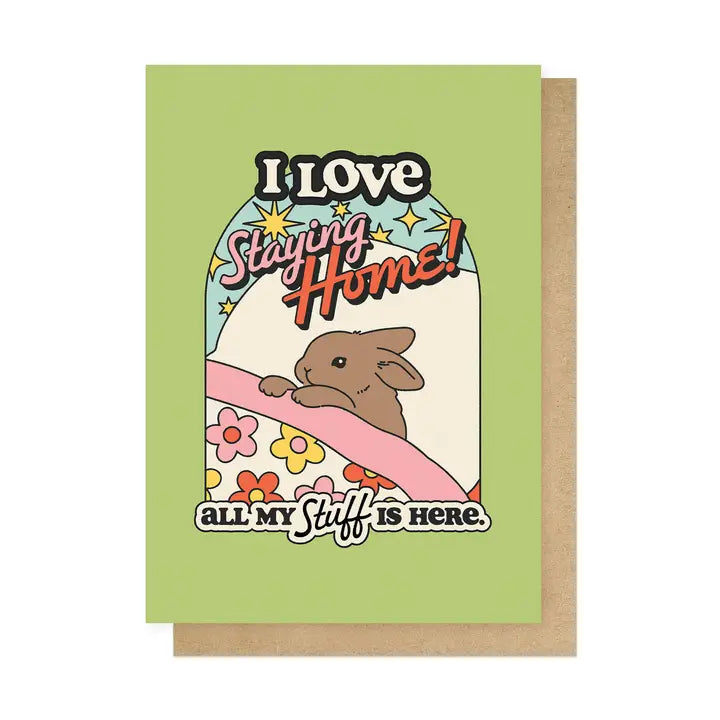 East End Prints card: a rabbit in a bed of flowers, with 'I love staying home! All my stuff is here.'