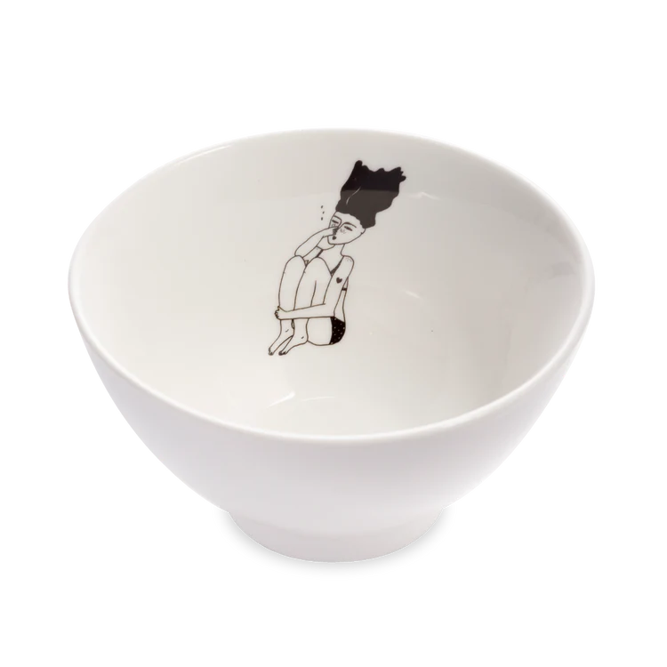 Helen B white bowl with a small line drawing of a man diving inside