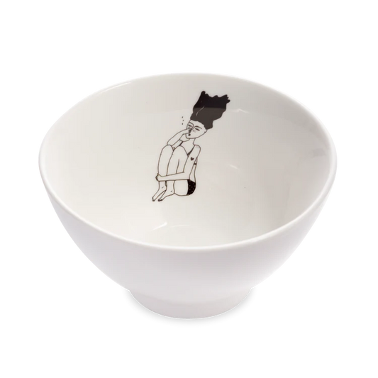 Helen B white bowl with a small line drawing of a man diving inside